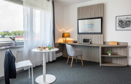 Aparthotel{Stadt} - {Name}