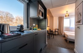 Aparthotel{Stadt} - {Name}